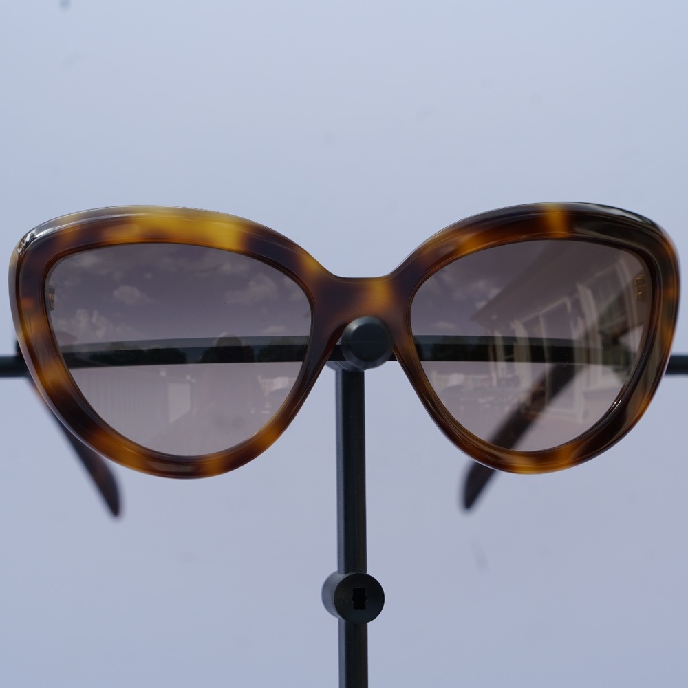 BRAND NEW DESIGNER PRADA SUNGLASSES ON SALE NOW